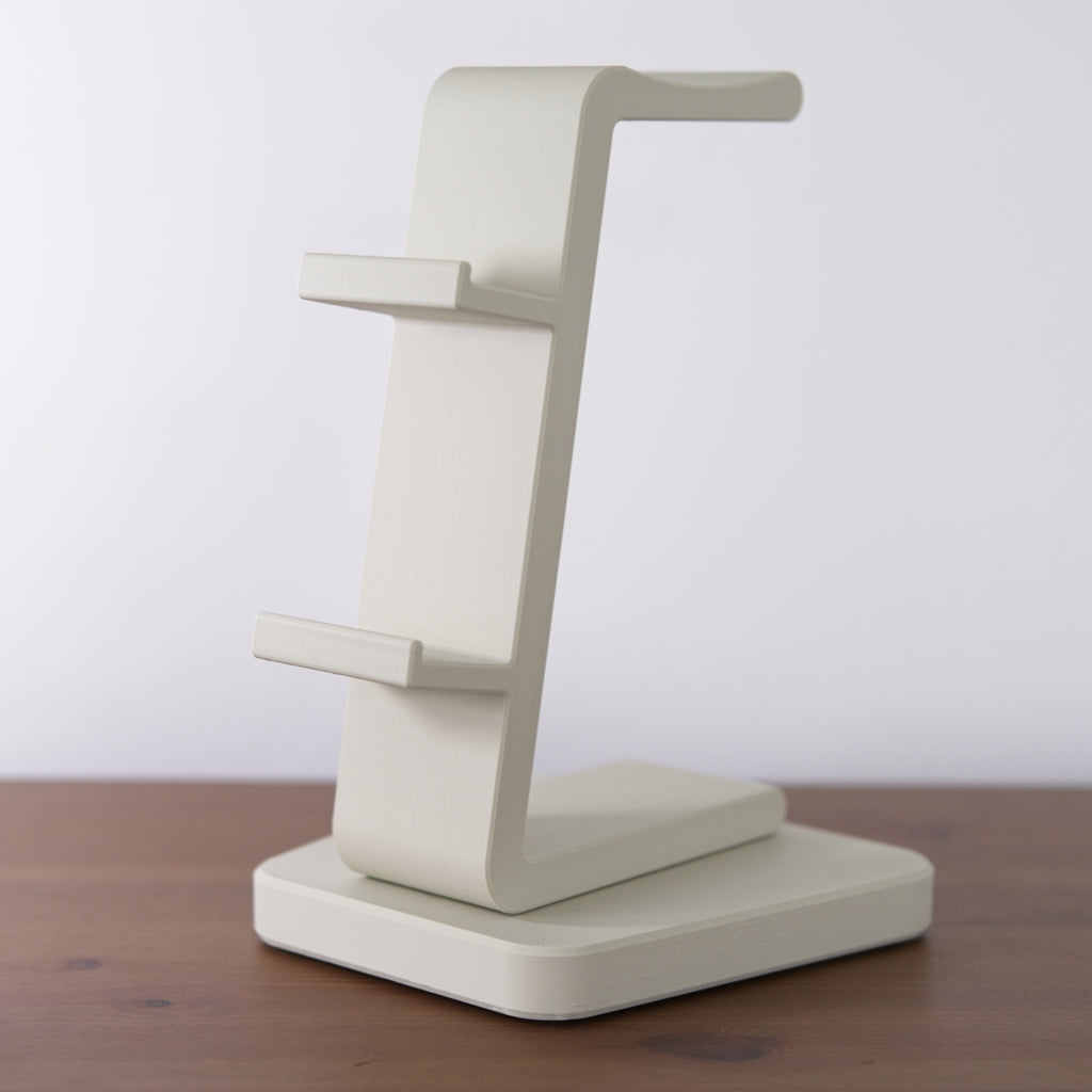 All-in-One Headset and Controller Gaming Stand displayed in a sleek design to hold gaming equipment.