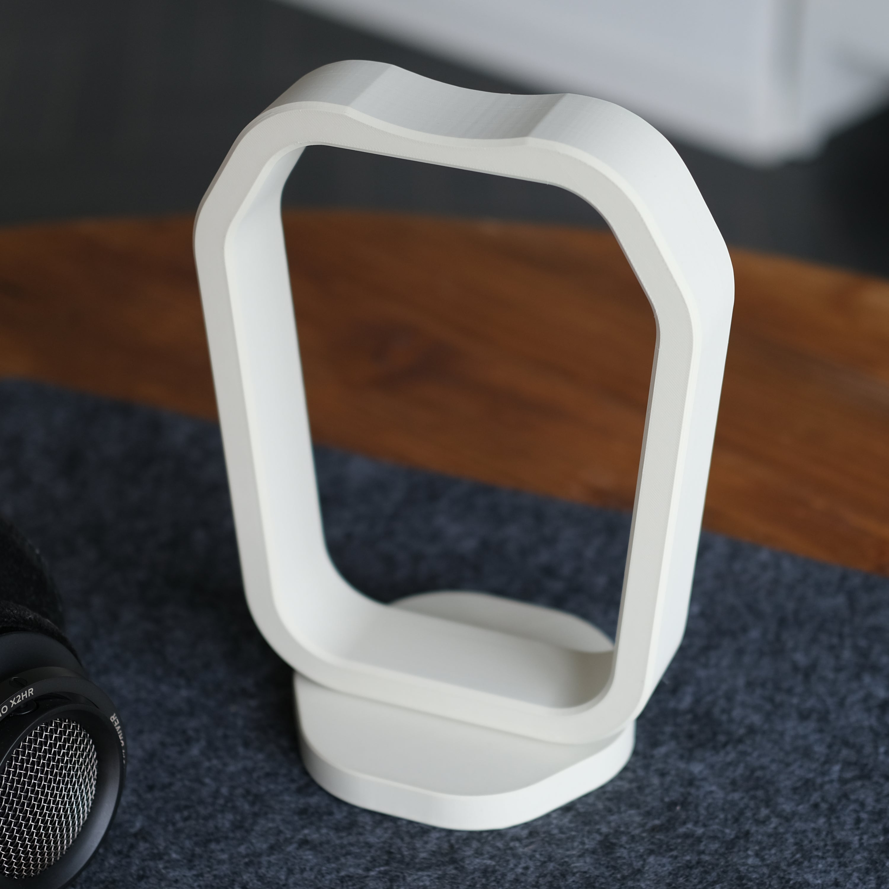Stylish Headphone Display Stand designed to enhance workspace aesthetics and functionality.
