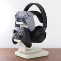 All-in-One Headset and Controller Gaming Stand with headsets and controllers organised tidily.